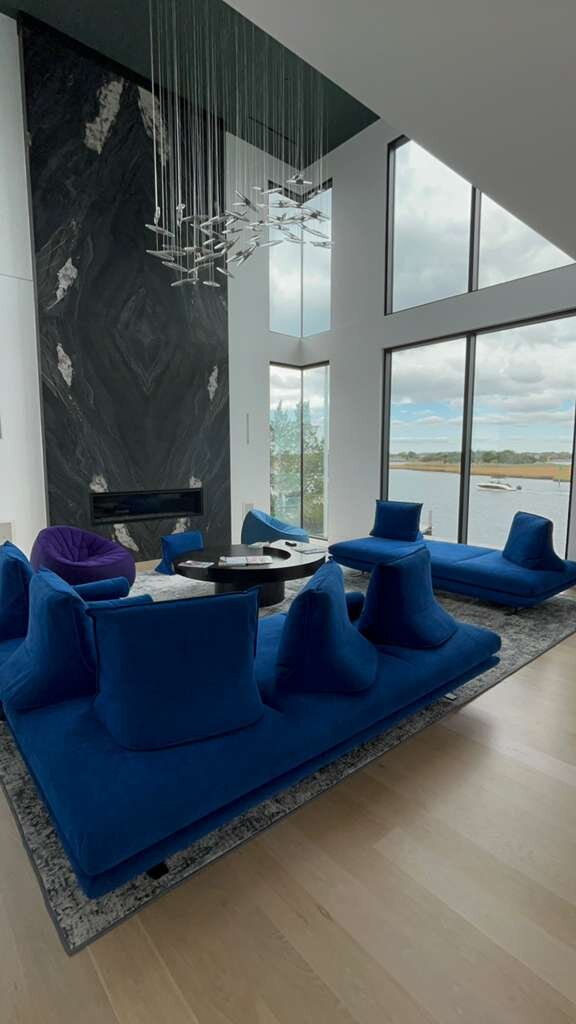 Stunning floor-to-ceiling black marble fireplace feature wall