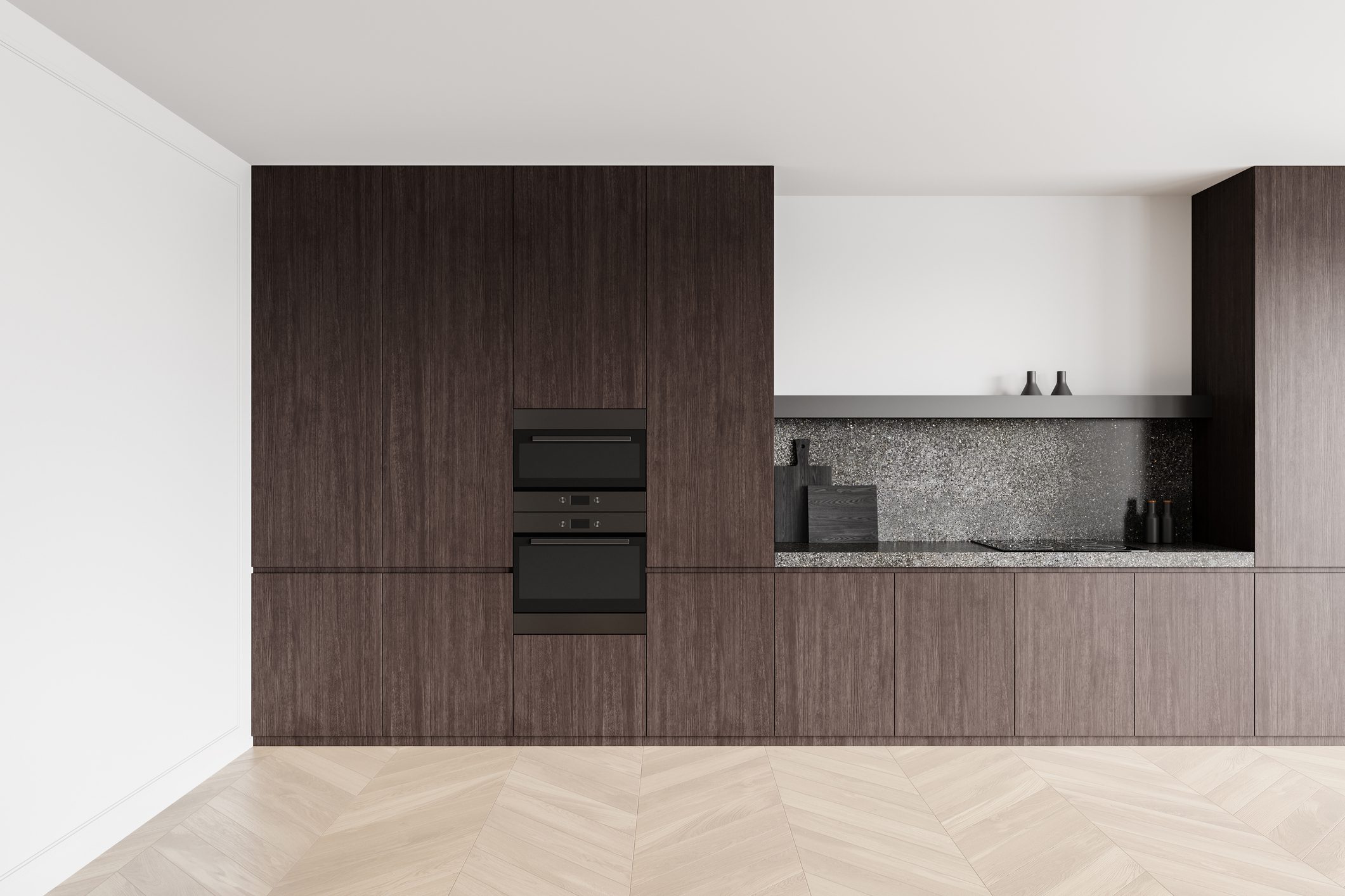 Minimalist kitchen with dark wood cabinets and built-in appliances.
